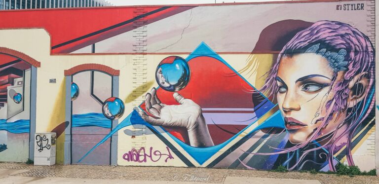 street art sur les quais de Lisbonne artiste styler